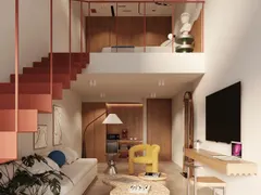 Suite Queen Duplex con escalera coral hacia el nivel superior, sala y escritorio